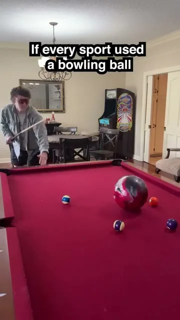 Still from the Pit Viper bowling ball edit, playing pool with a bowling ball