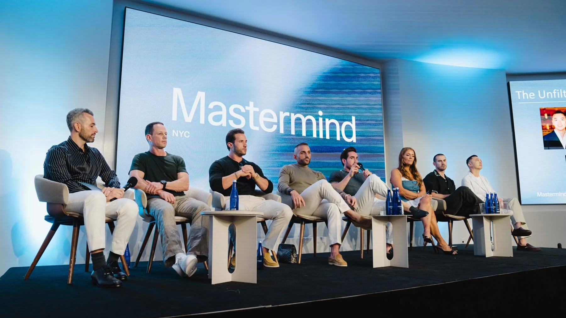 Eight founders on stage for the Unfiltered Founder Roundtable panel at the NYC Mastermind